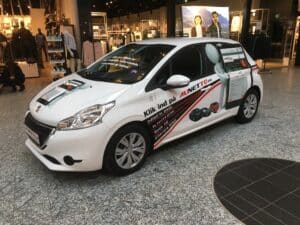 Peugeot 208 reklame i Herning Centret